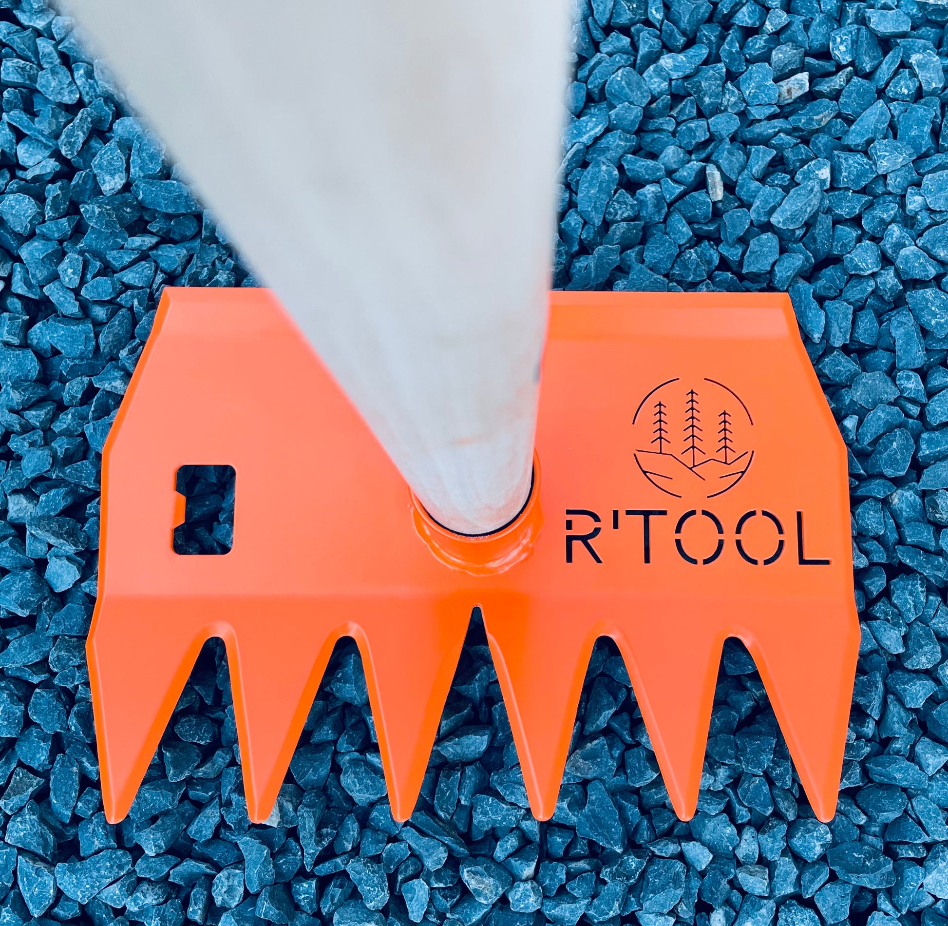 Top view of R'TOOL Shape'R 2 trail building rake with wooden handle and 6 sharpened teeth